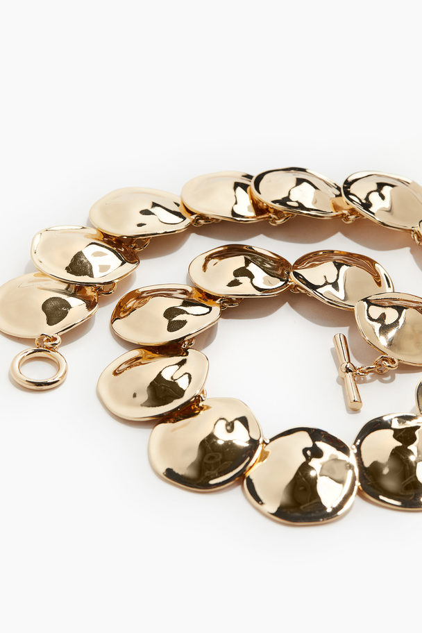 H&M Kurze Halskette aus Metallplättchen Goldfarben