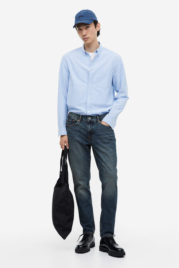 H&M Regular Tapered Jeans Dunkles Denimblau