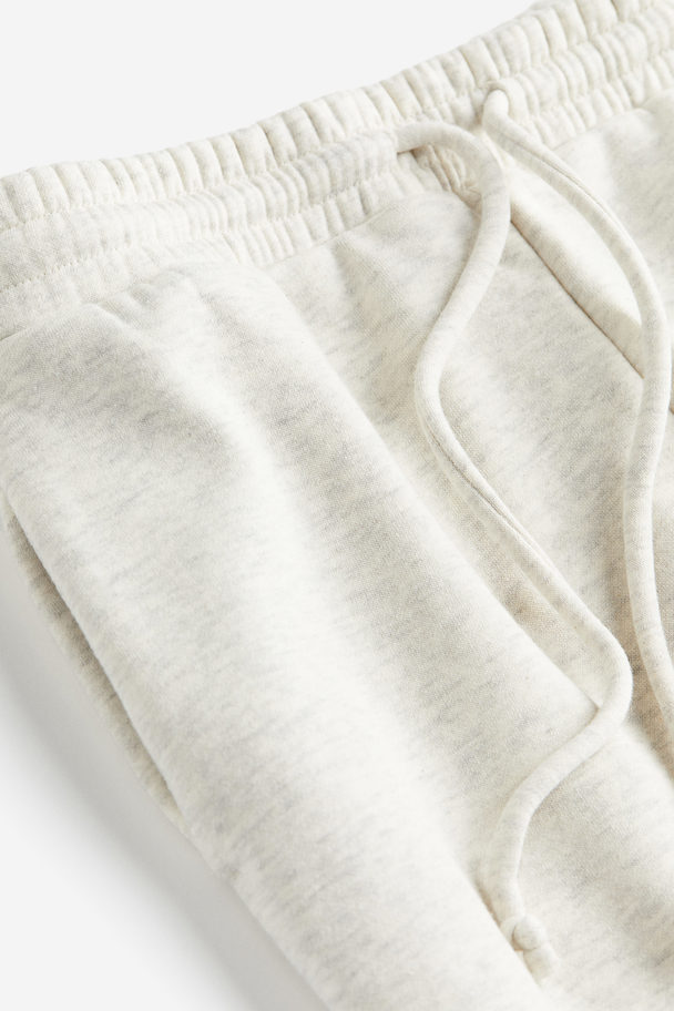 H&M Weite Sweatpants Cremefarben meliert