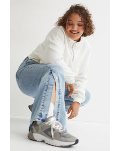 H&M+ Flared Low Waist Jeans Hellblau