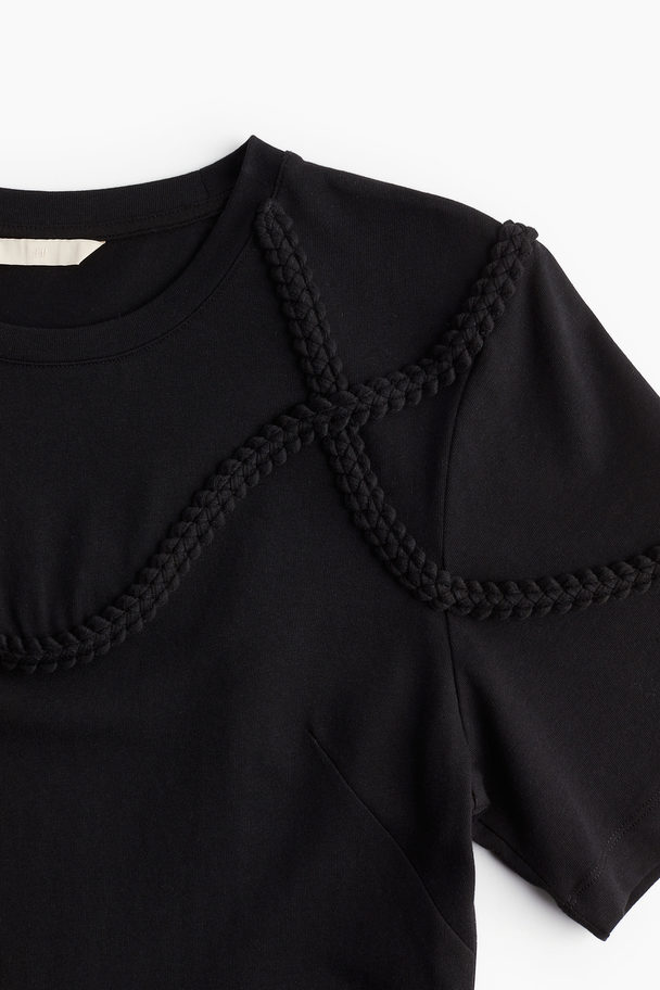 H&M T-Shirt-Kleid mit geflochtenen Besätzen Schwarz