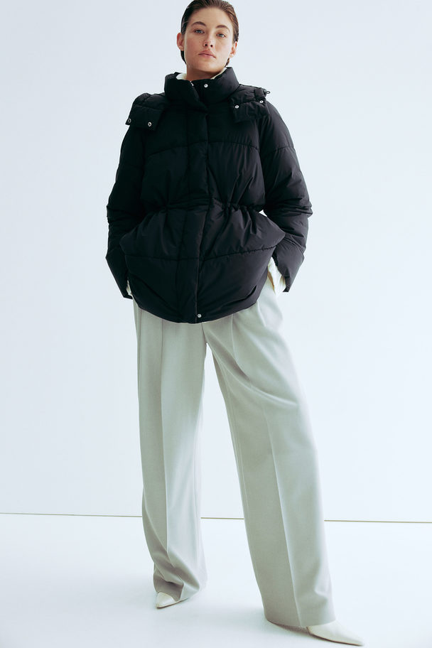 H&M Puffer Jacket mit Kapuze Schwarz