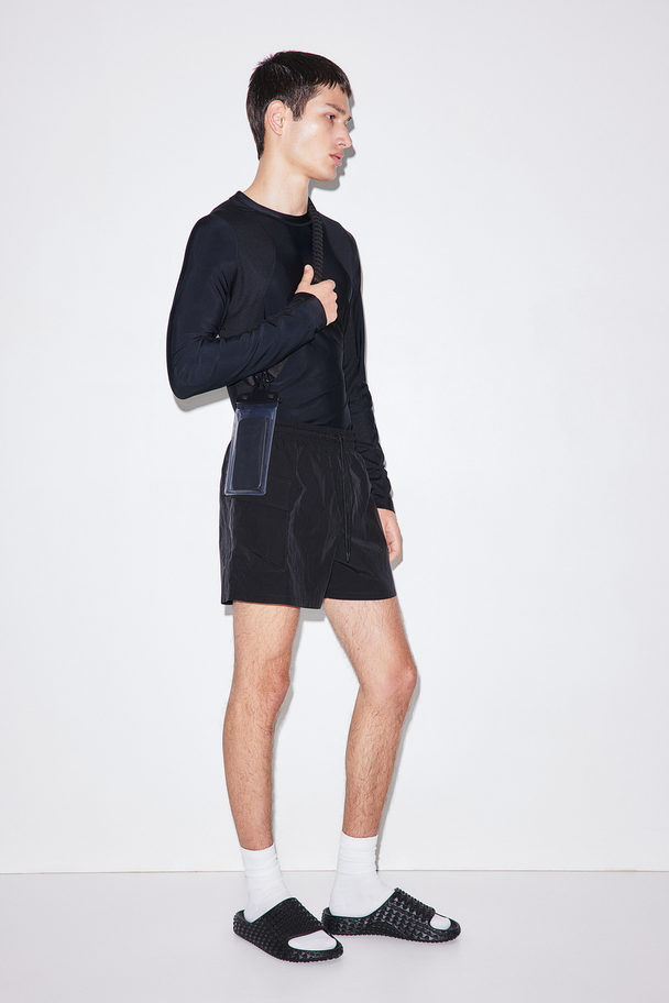 H&M Rashguard Schwarz