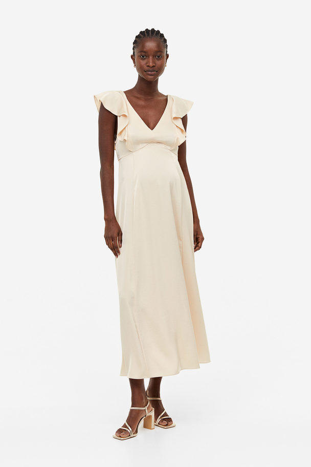 H&M MAMA Kleid mit Volants Hellbeige