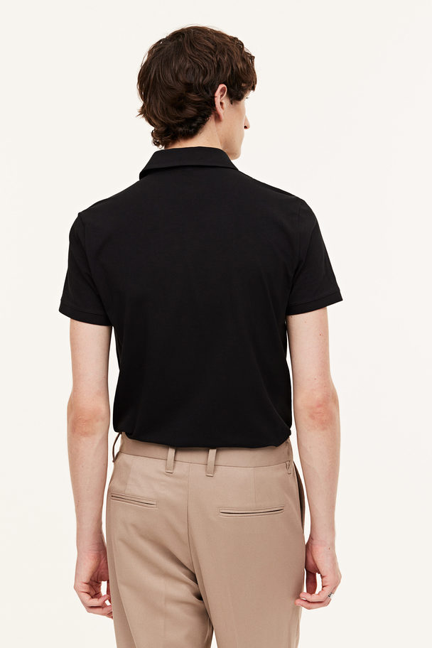 H&M Poloshirt in Slim Fit Schwarz