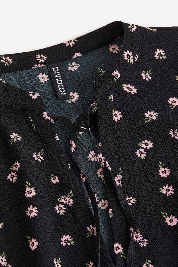 H&M A-linjeklänning Svart/blommig
