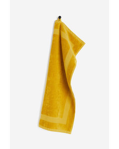 Handtuch aus Velours Gelb
