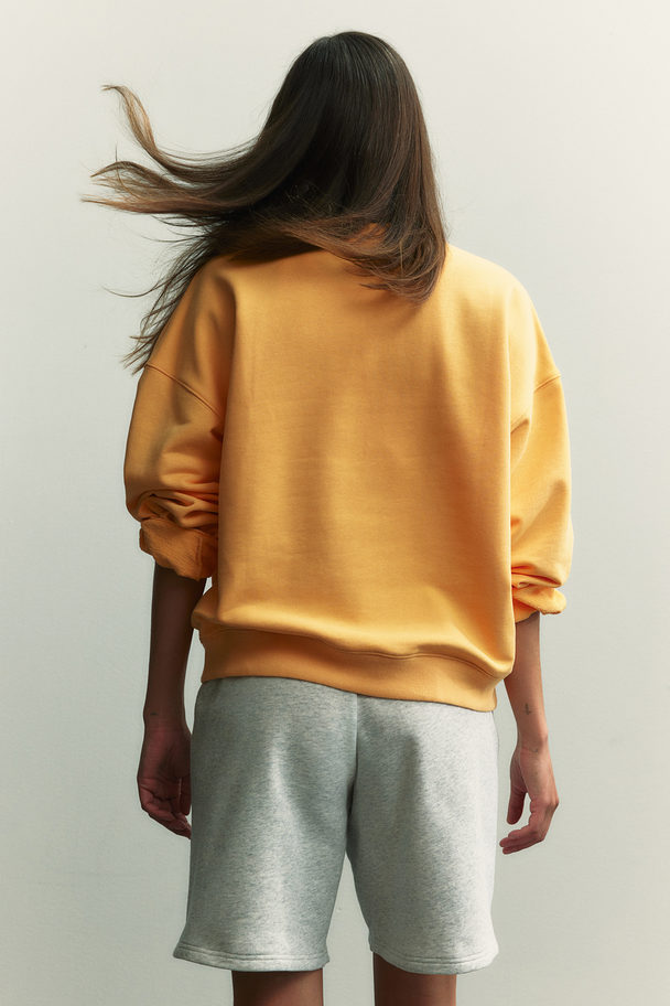 H&M Oversized Sport-Sweatshirt Gelb