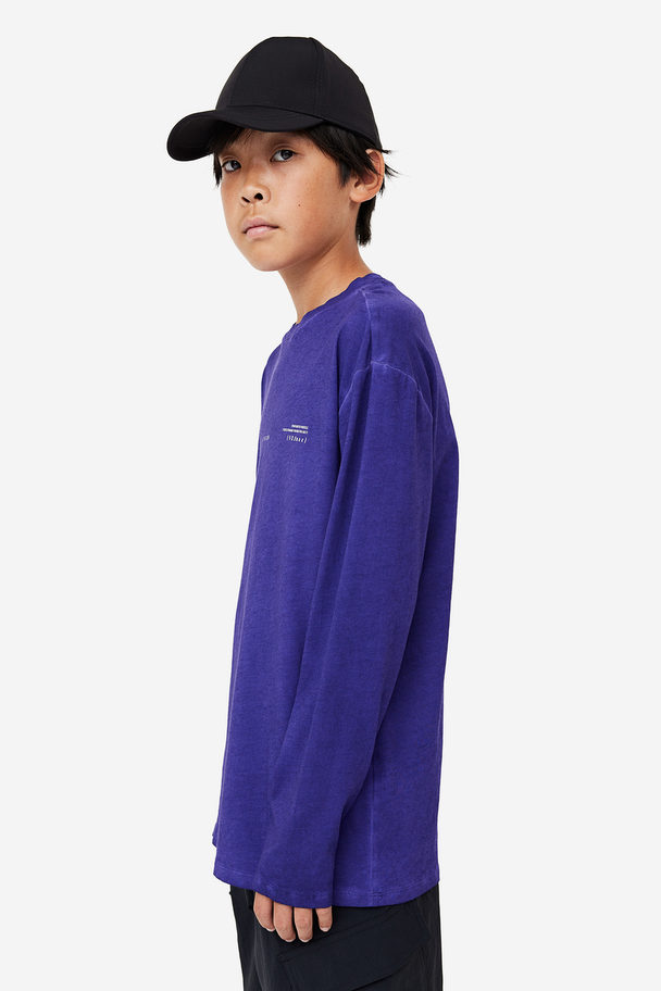 H&M DryMove™ Sportshirt mit Print Dunkellila/Washed out
