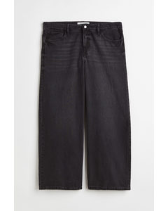H&M+ Wide Low Jeans Schwarz