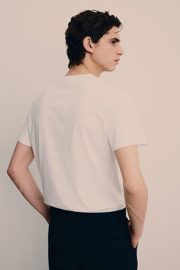 H&M T-Shirt mit V-Ausschnitt Muscle Fit Weiß