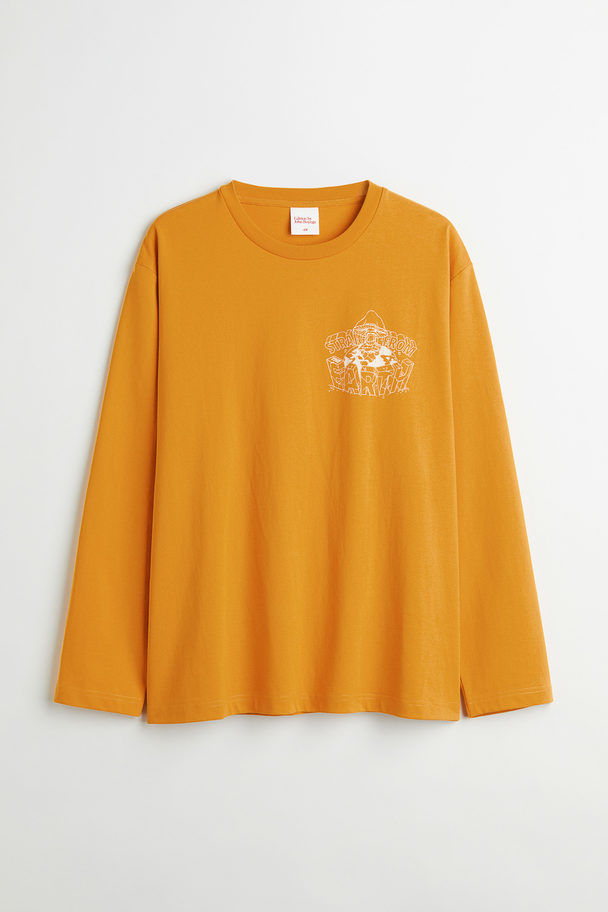 H&M Langarmshirt aus Baumwolle mit Print Ockergelb