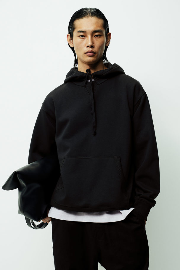 H&M Hoodie in Relaxed Fit Schwarz