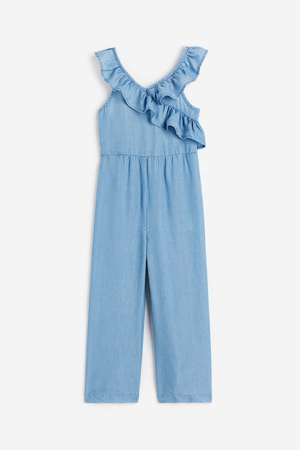 H&M Jumpsuit aus Lyocell mit Volantbesatz Blau
