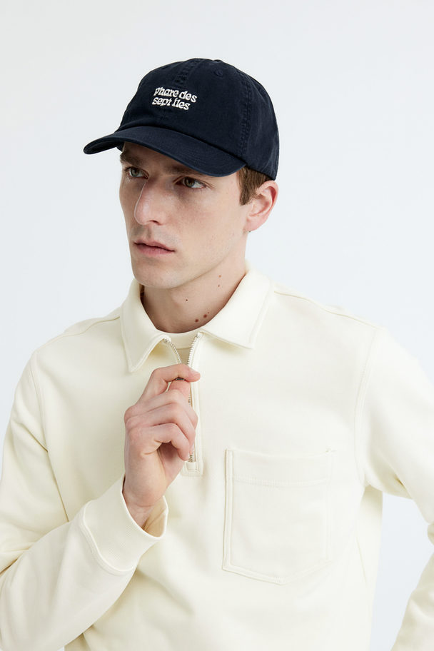 H&M Poloshirt aus Baumwolle Regular Fit Cremefarben