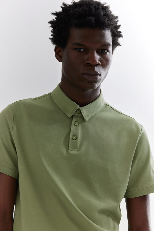 H&M COOLMAX® Poloshirt Slim Fit Grün