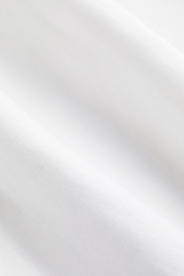 H&M Tunika mit V-Ausschnitt Weiß