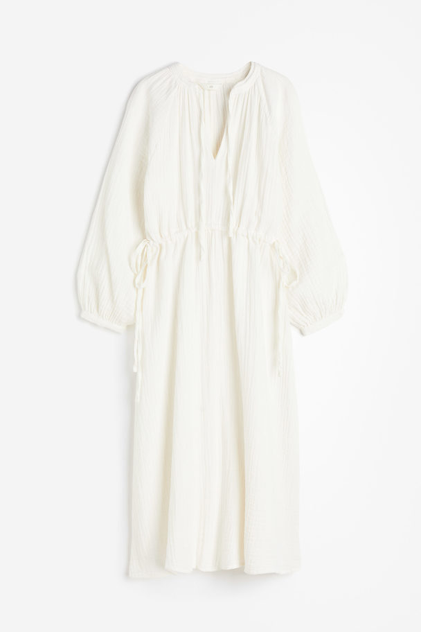 H&M Doppelt gewebtes Baumwollkleid mit Bindedetail Cremefarben