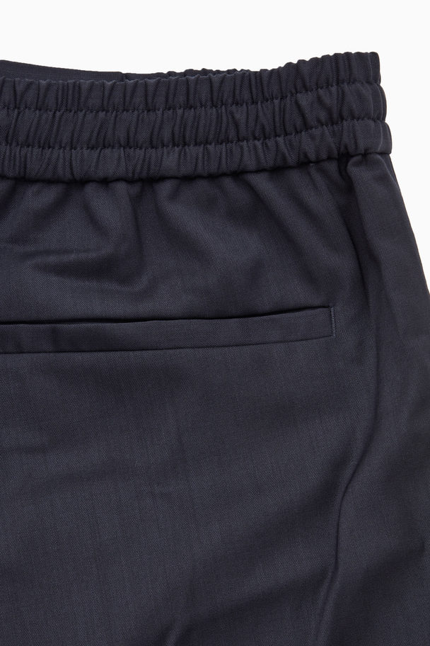 COS Tapered Elasticated Wool-twill Trousers Dark Navy