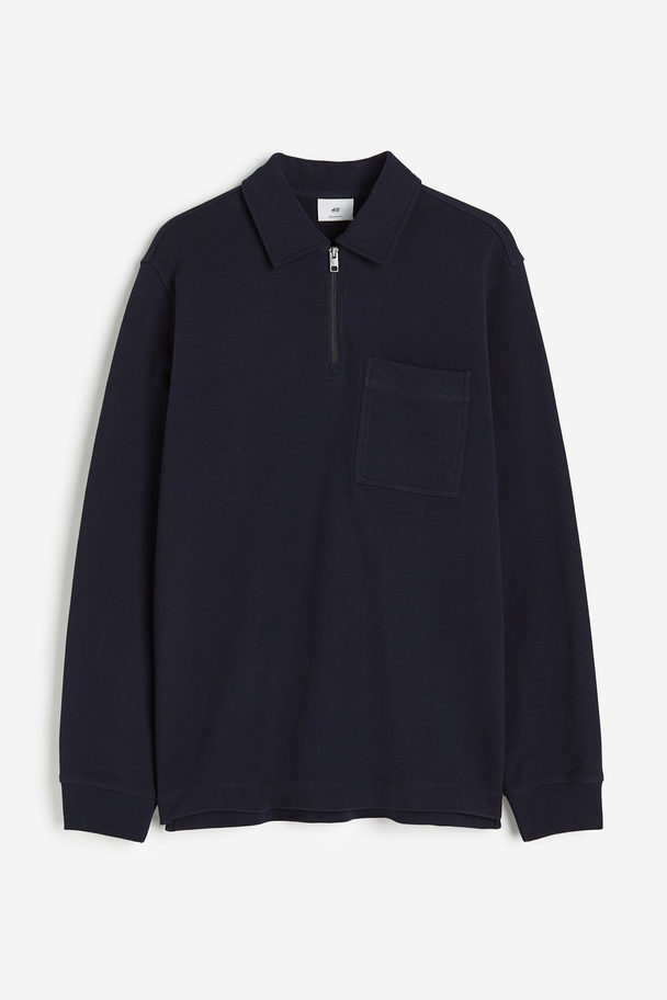 H&M Poloshirt aus Baumwolle Regular Fit Marineblau
