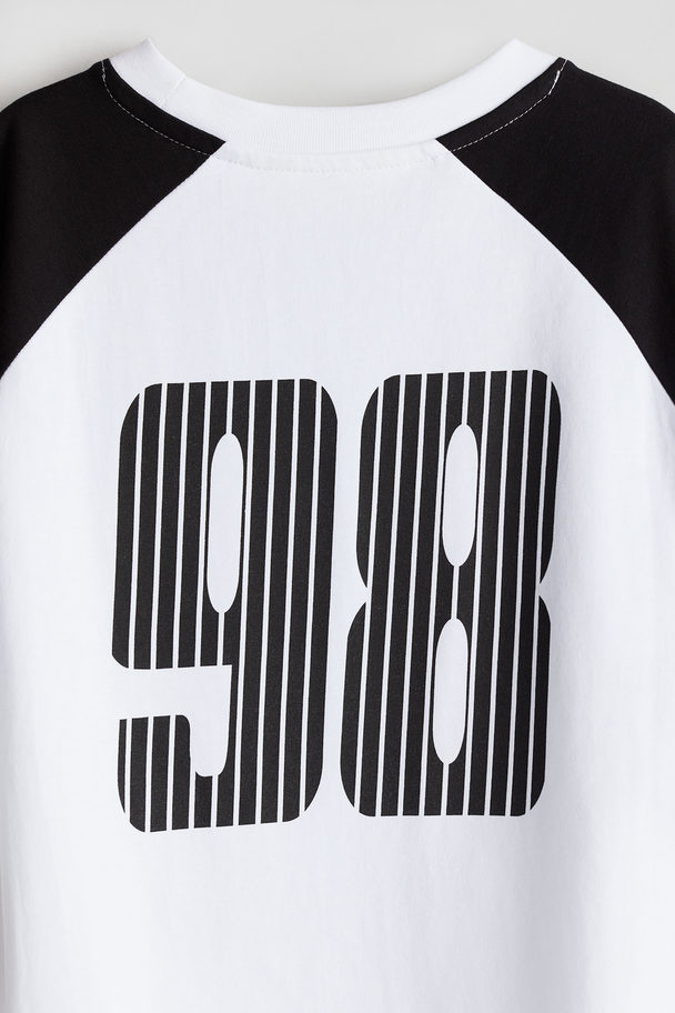 H&M T-Shirt mit Print Weiß/Subreal