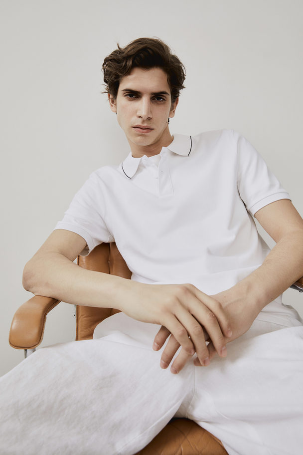H&M Poloshirt aus Baumwolle Slim Fit Weiß
