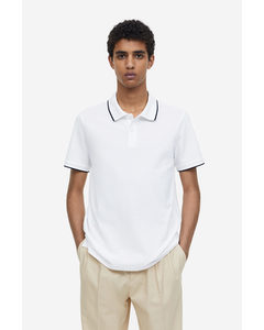 Poloshirt aus Baumwolle Slim Fit Weiß