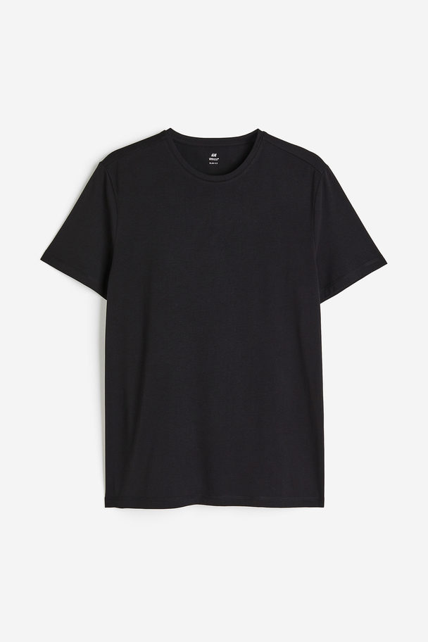 H&M Coolmax®-t-shirt - Slim Fit Zwart