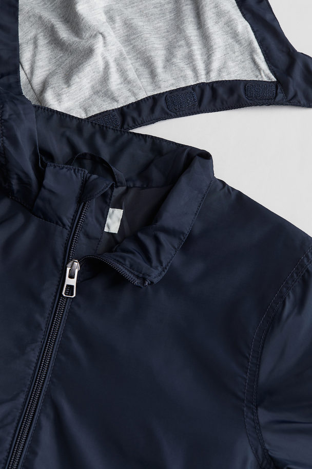 H&M Windjacke mit Kapuze Dunkelblau