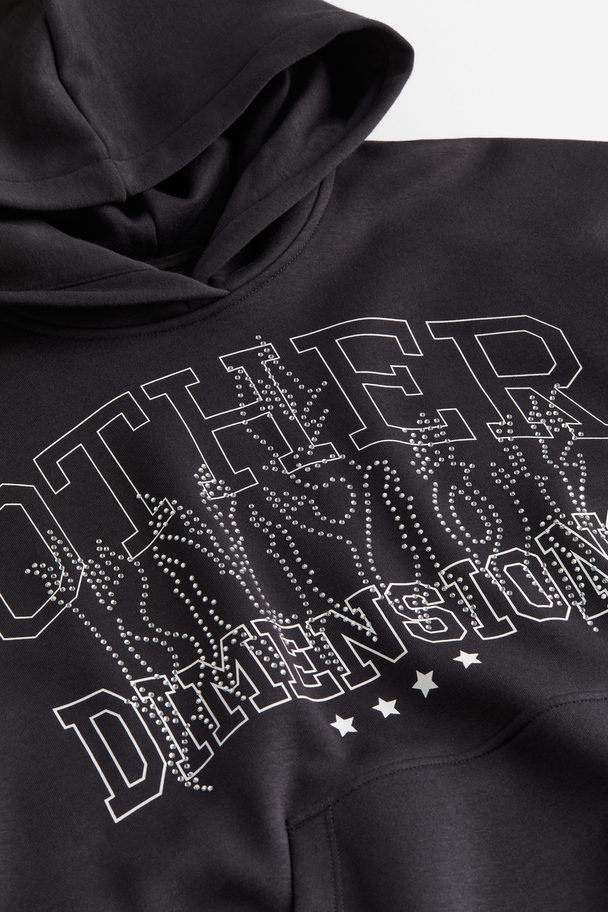 H&M Oversized Capuchonsweater Met Motief Zwart/other Dimensions