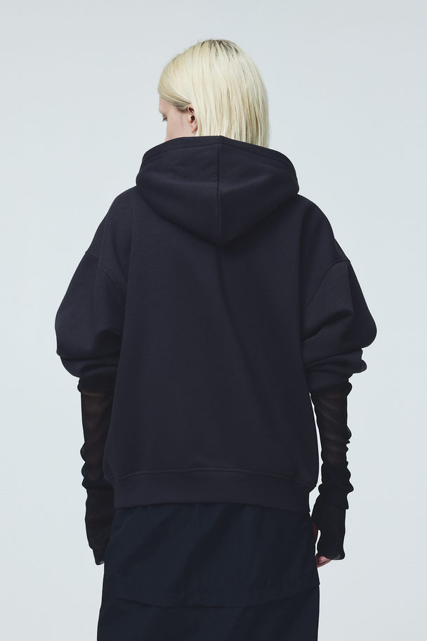 H&M Oversized Capuchonsweater Met Motief Zwart/other Dimensions
