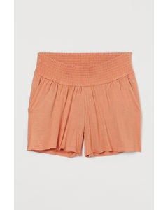 MAMA Shorts mit Smokbund Orange