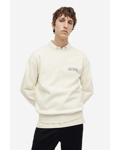 Bedrucktes Sweatshirt in Loose Fit Cremefarben/Stones