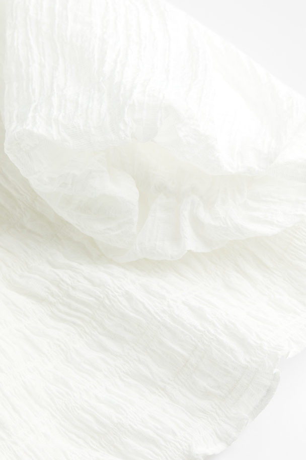 H&M Gesmoktes Off-Shoulder-Shirt Weiß