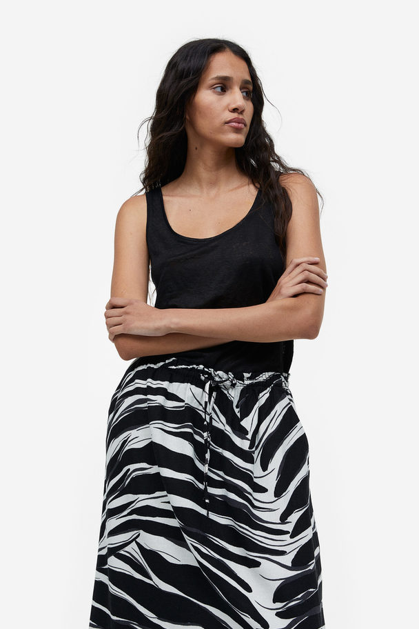 H&M Flared Skirt Black/patterned