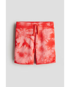 Sweatshorts mit Print Knallrot/Batikmuster