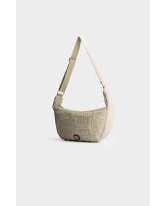 MONOGRAM QUILTED SLING BAG Braun