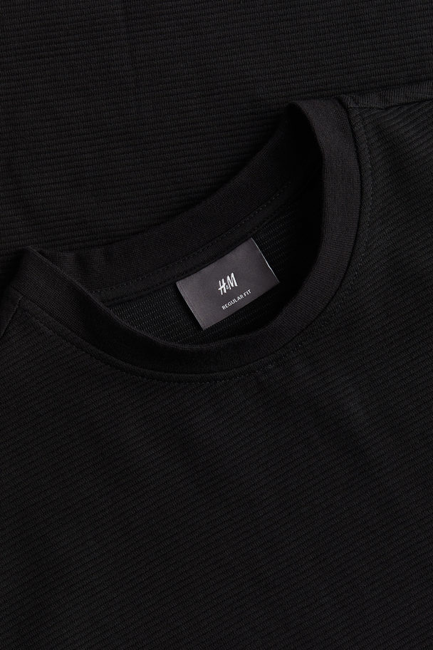 H&M Geripptes T-Shirt in Regular Fit Schwarz