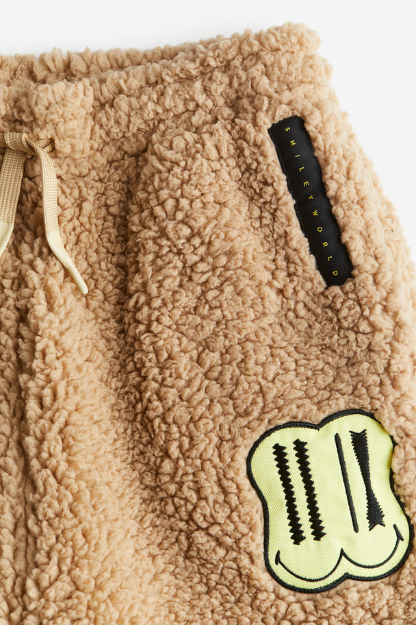 H&M Joggpants aus Teddyfleece Beige/SmileyWorld®