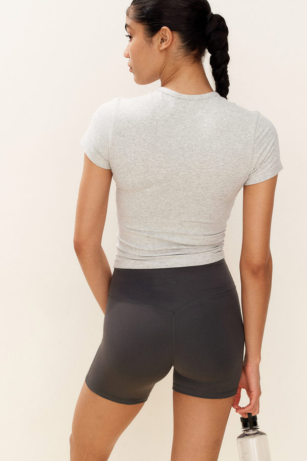 H&M DryMove™ Sportshirt aus Baumwolle Hellgraumeliert