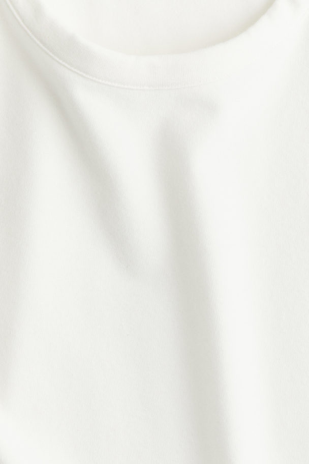 H&M DryMove™ Sportshirt aus Baumwolle Weiß