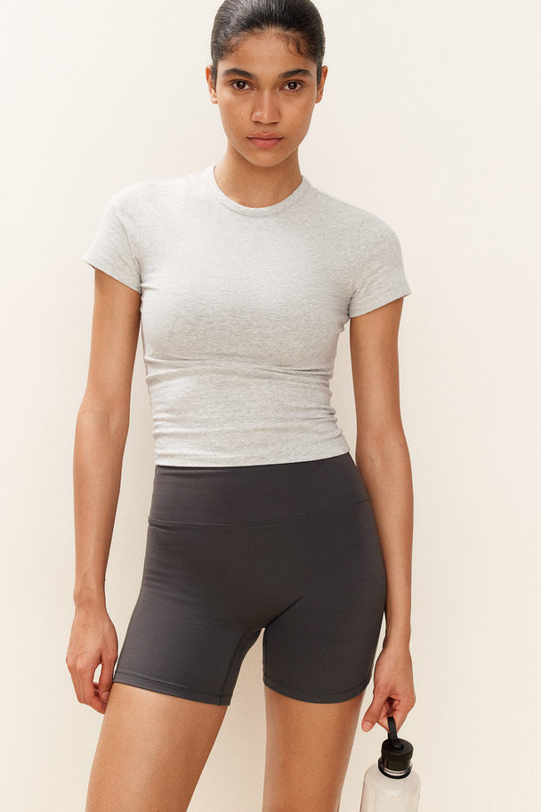 H&M DryMove™ Sportshirt aus Baumwolle Hellgraumeliert