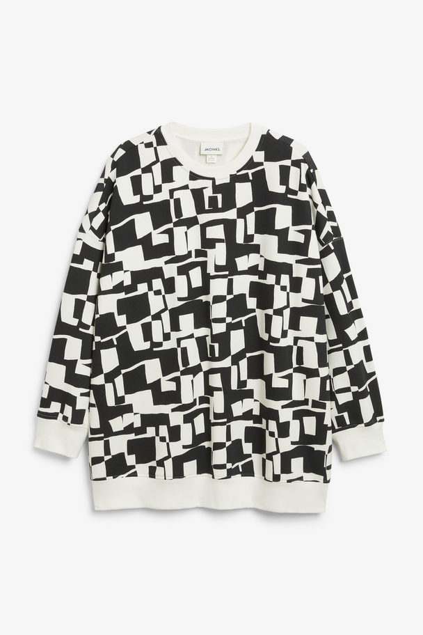 Monki Oversize-Sweatshirt mit Cut-out-Muster und Rundhalsausschnitt Schwarzes Cut-out-Muster