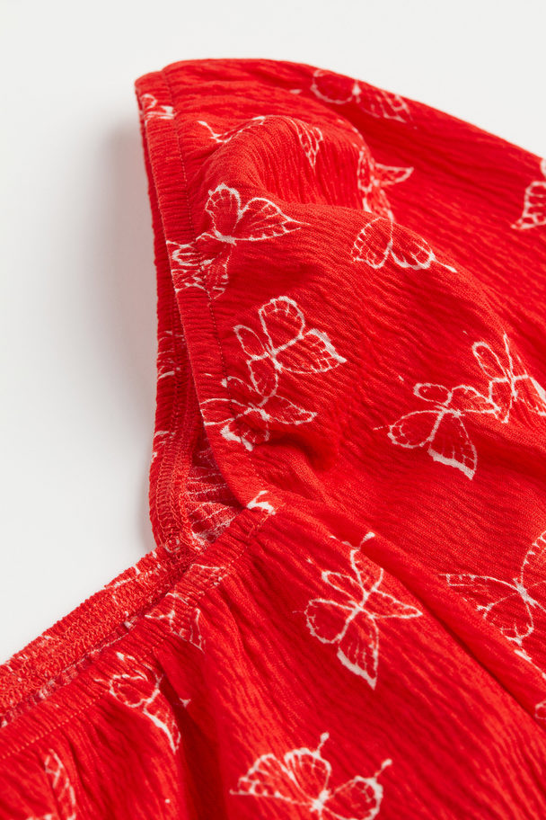 H&M Crêpe-Bluse mit Bändern Rot/Schmetterlinge