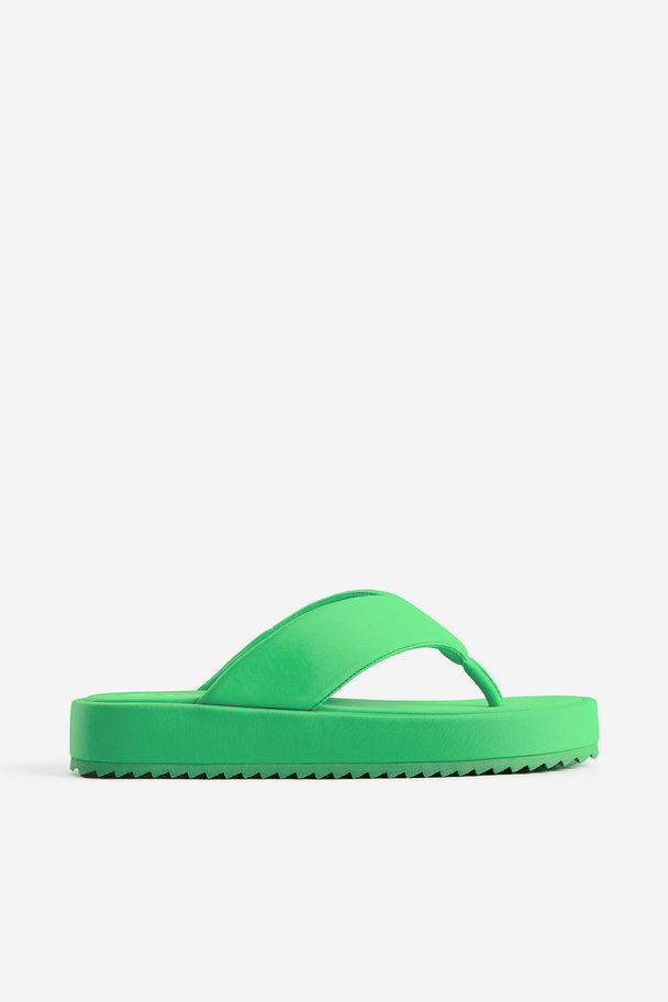 H&M Flatform-slippers Heldergroen