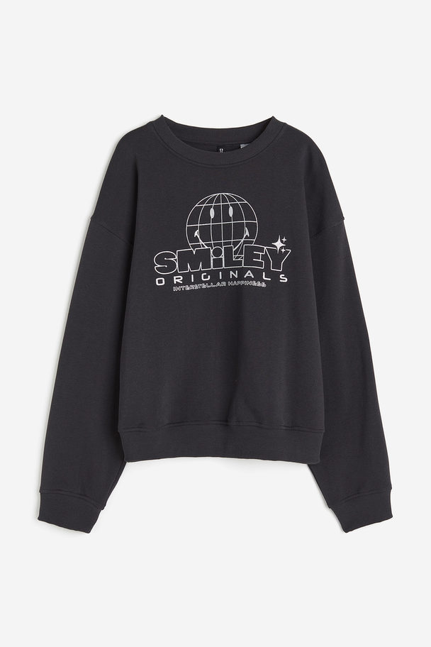 H&M Sweatshirt mit Print Dunkelgrau/Smiley®