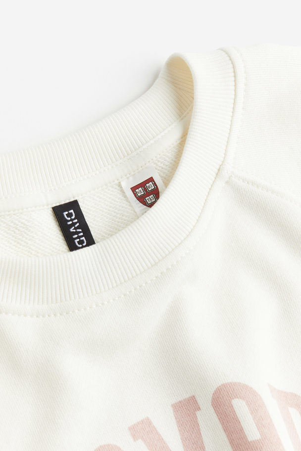 H&M Sweatshirt mit Print Cremefarben/Harvard University
