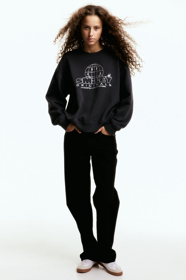 H&M Sweatshirt mit Print Dunkelgrau/Smiley®