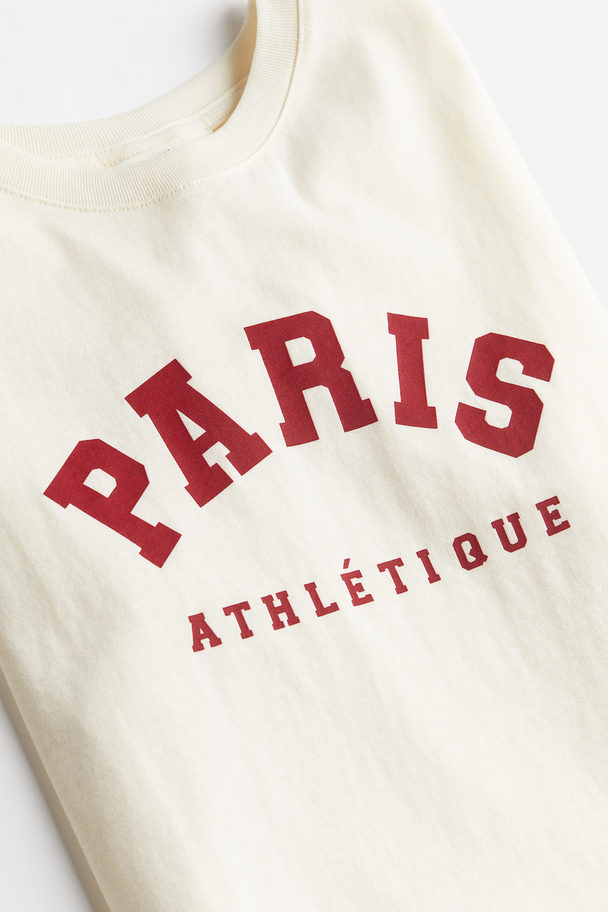 H&M T-Shirt aus Baumwolle Cremefarben/Paris