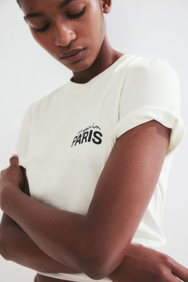 H&M T-Shirt aus Baumwolle Cremefarben/Paris